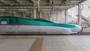The green E5 Series bullet train. Piti Sirisriro - Shutterstock.com