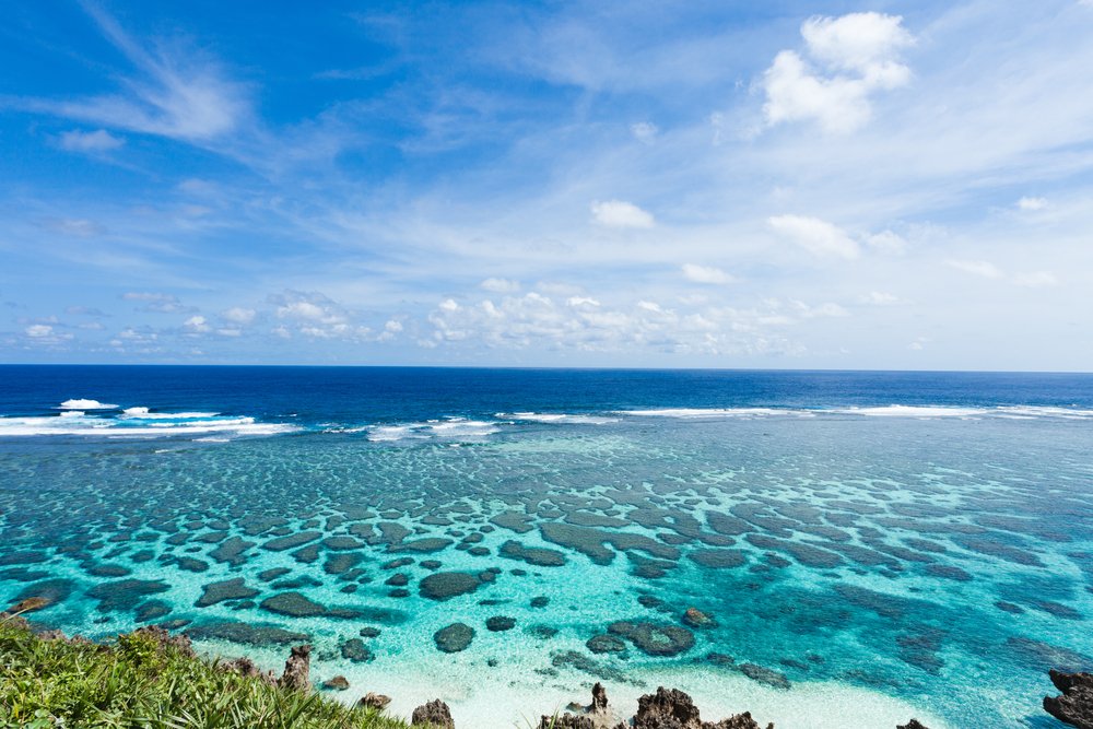Horizon over coral reef and clear blue tropical water, Miyako Island