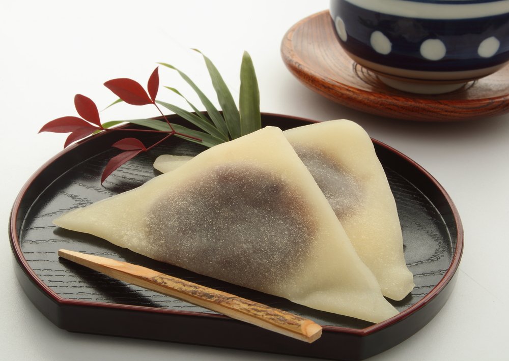 Type of sweet made with bean paste (local delicacy in Kyoto cinnamon-seasoned steamed dough made from ground ric