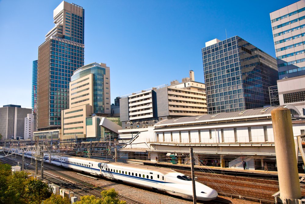 Railway with skyline shinkansen at Odaiba ,Tokyo, Japan. Shinkansen is world's busiest high-speed railway operated by four Japan Railways companies