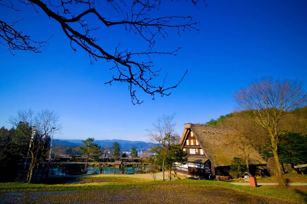 Hida Folk Village (Hida No Sato) with blue sky in spring season, Takayama