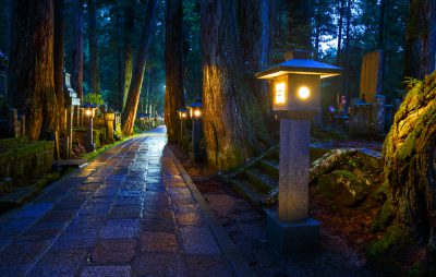 Buddhist ancient religious place hidden in the secret scary forest during the night - cemetery in Koyasan