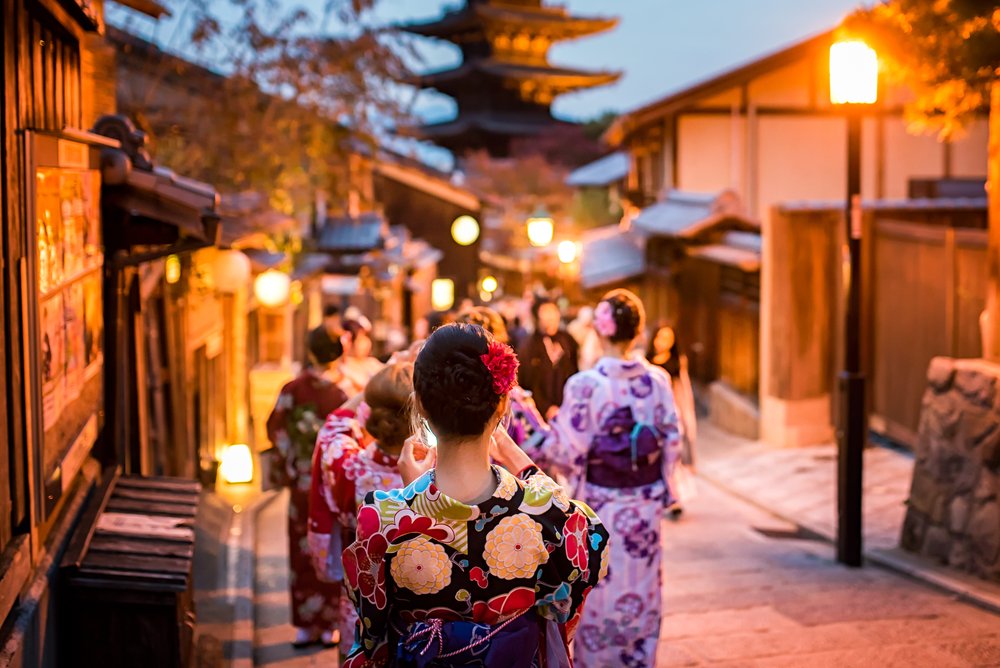 Young women wearing traditional Japanese Kimono at Yasaka Pagoda and Sannen Zaka Street in Kyoto